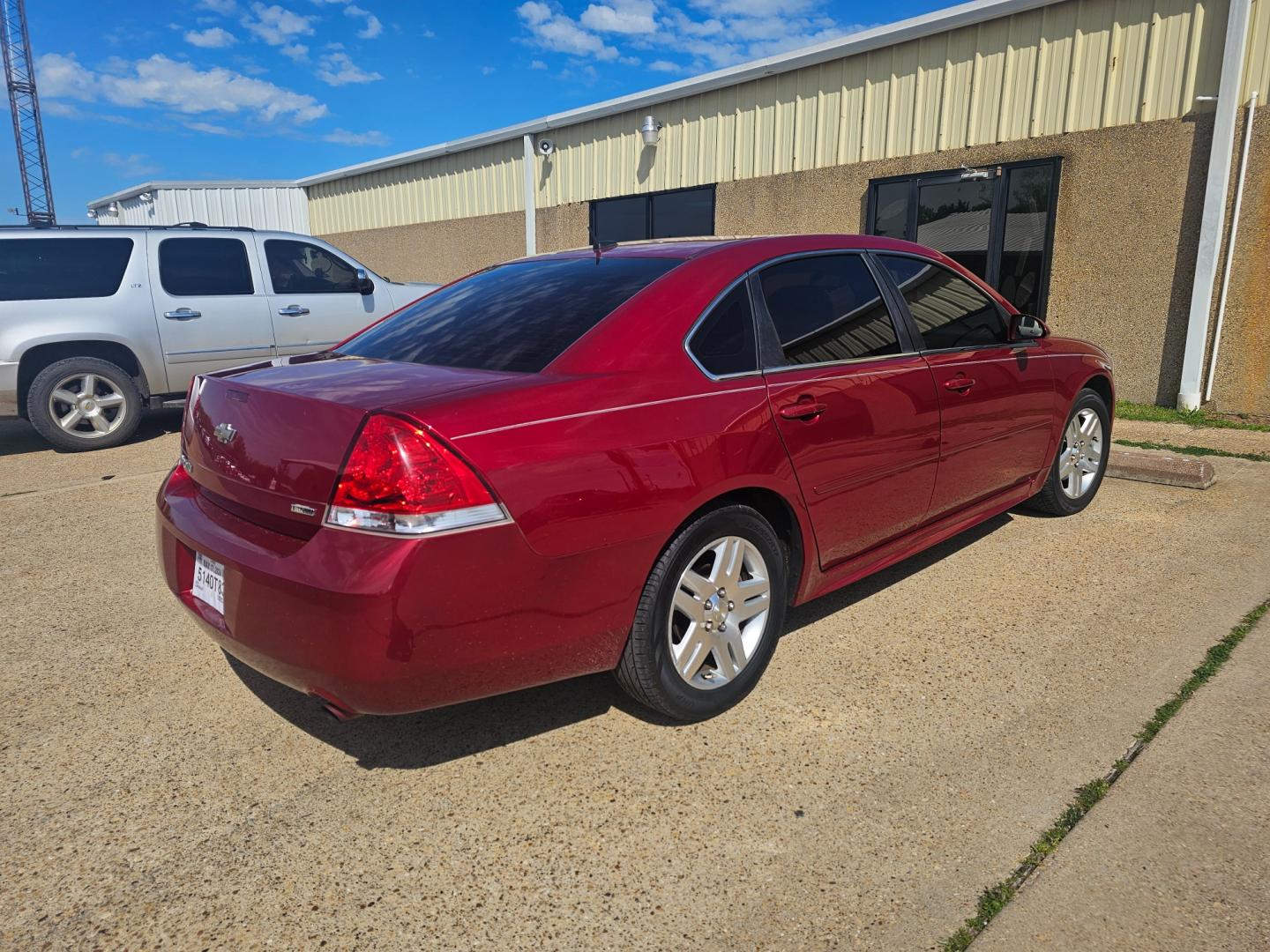 2015 RED Chevrolet Impala Limited LT (2G1WB5E30F1) with an 3.6L V6 DOHC 16V FFV engine, 6-Speed Automatic transmission, located at 533 S Seven Points BLVD, Seven Points, TX, 75143, (430) 255-4030, 32.313999, -96.209351 - Photo#2